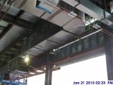Installing black iron duct work at the 4th floor Facing South.jpg